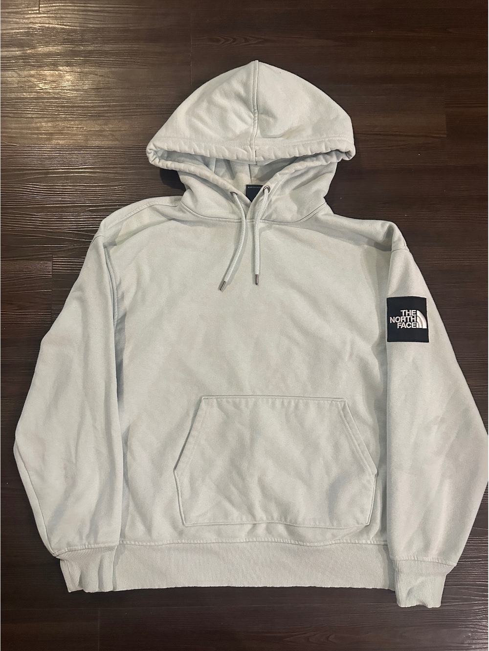 The north face women’s hoodie large light blue with arm patch